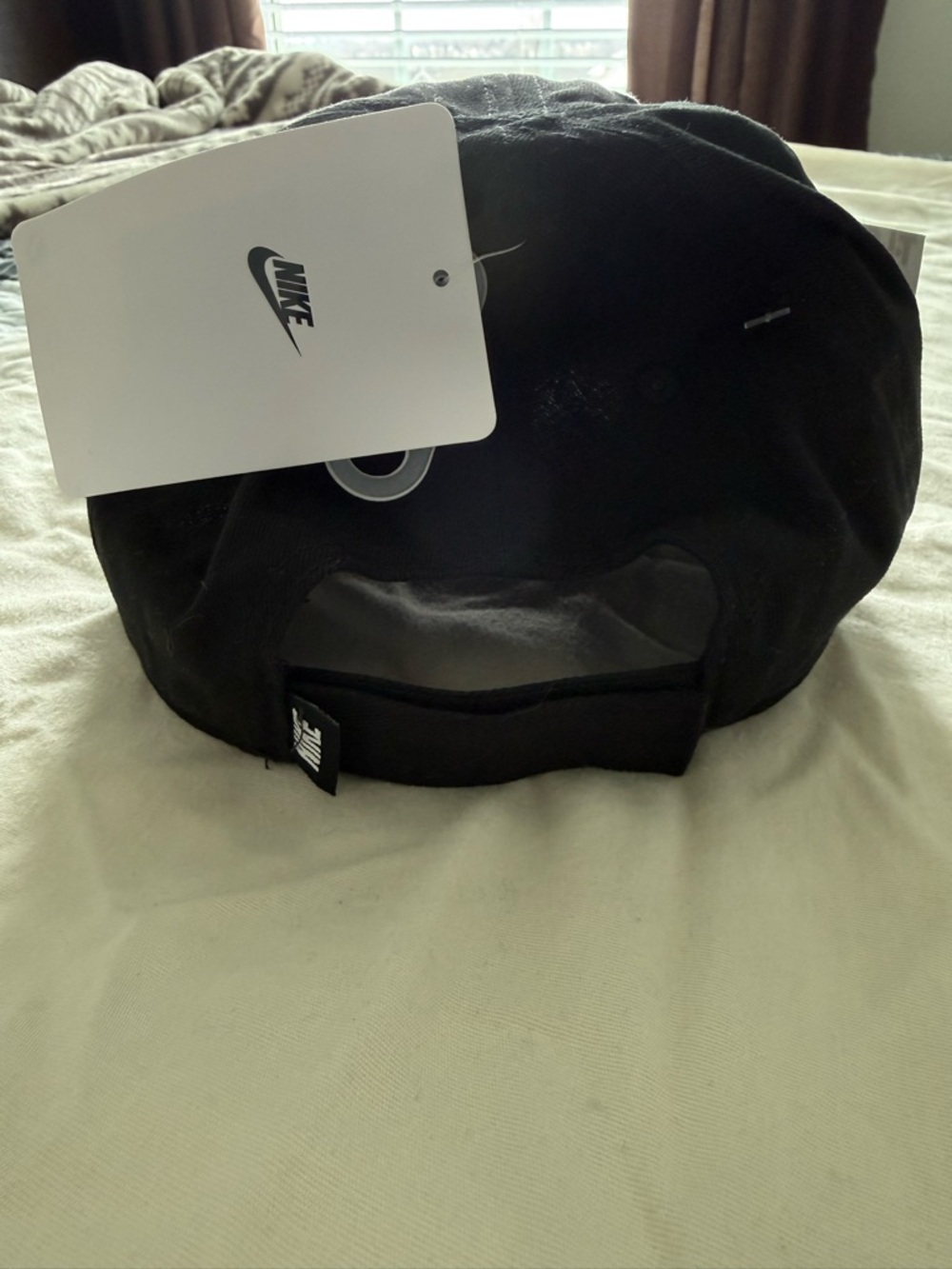 Nike Black Hat with White Tag and Swoosh - Picture 4 of 4